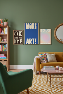 Bold 'More Art!' Typography Art Print as part of a gallery wall arrangement