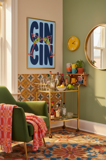 Gin Cin Cocktail Typography Art Print shown framed in a modern room setting