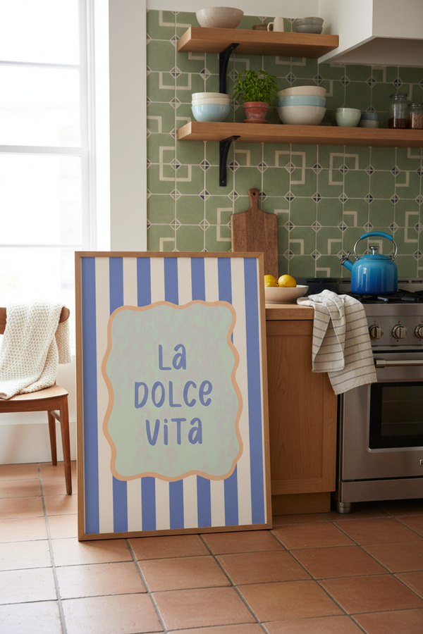 La Dolce Vita Quote Art Print shown framed in a modern room setting