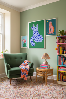 Playful Blue Spotted Cat Art Print as part of a gallery wall arrangement