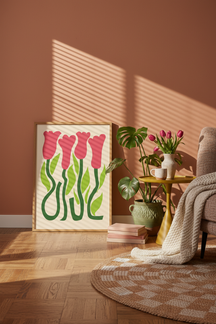 Playful Pink Tulip Field Art Print shown framed in a modern room setting