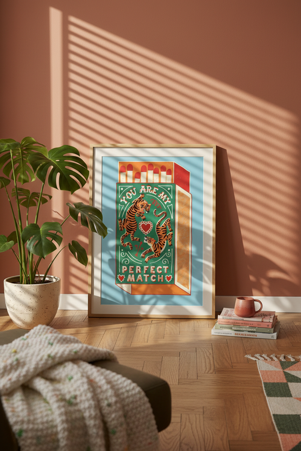 Playful Tiger Matchbox Art Print shown framed in a modern room setting