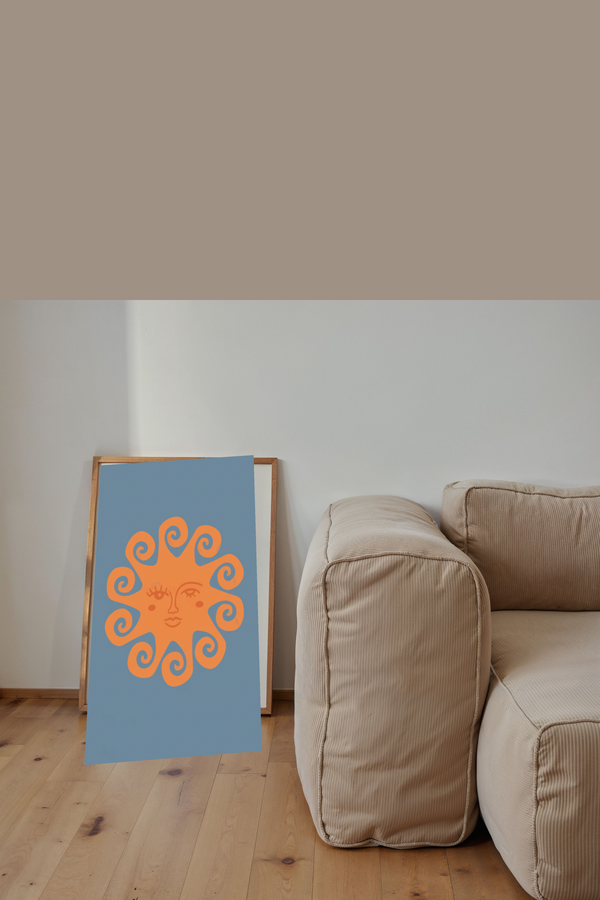 Playful Winking Sun Art Print shown framed in a modern room setting