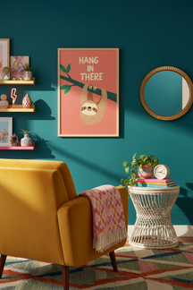 Sloth 'Hang In There' - Playful Illustration Wall Art Print shown framed in a modern room setting