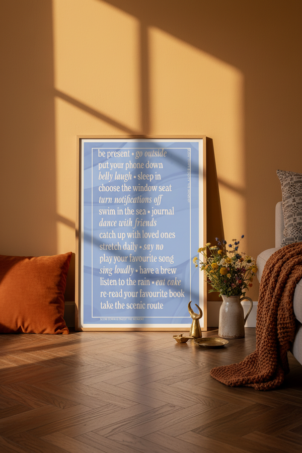 Slow Down & Enjoy The Moment Art Print shown framed in a modern room setting