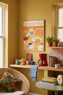 Vibrant Breakfast Club Art Print shown framed in a modern room setting