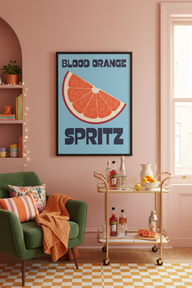 Zesty Blood Orange Spritz Art Print shown framed in a modern room setting