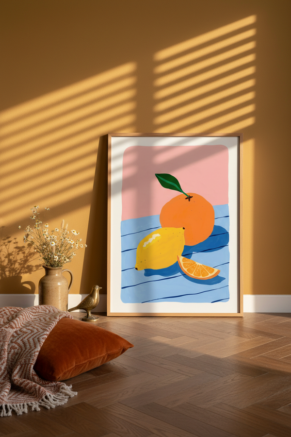 Zesty Citrus Still Life Art Print shown framed in a modern room setting